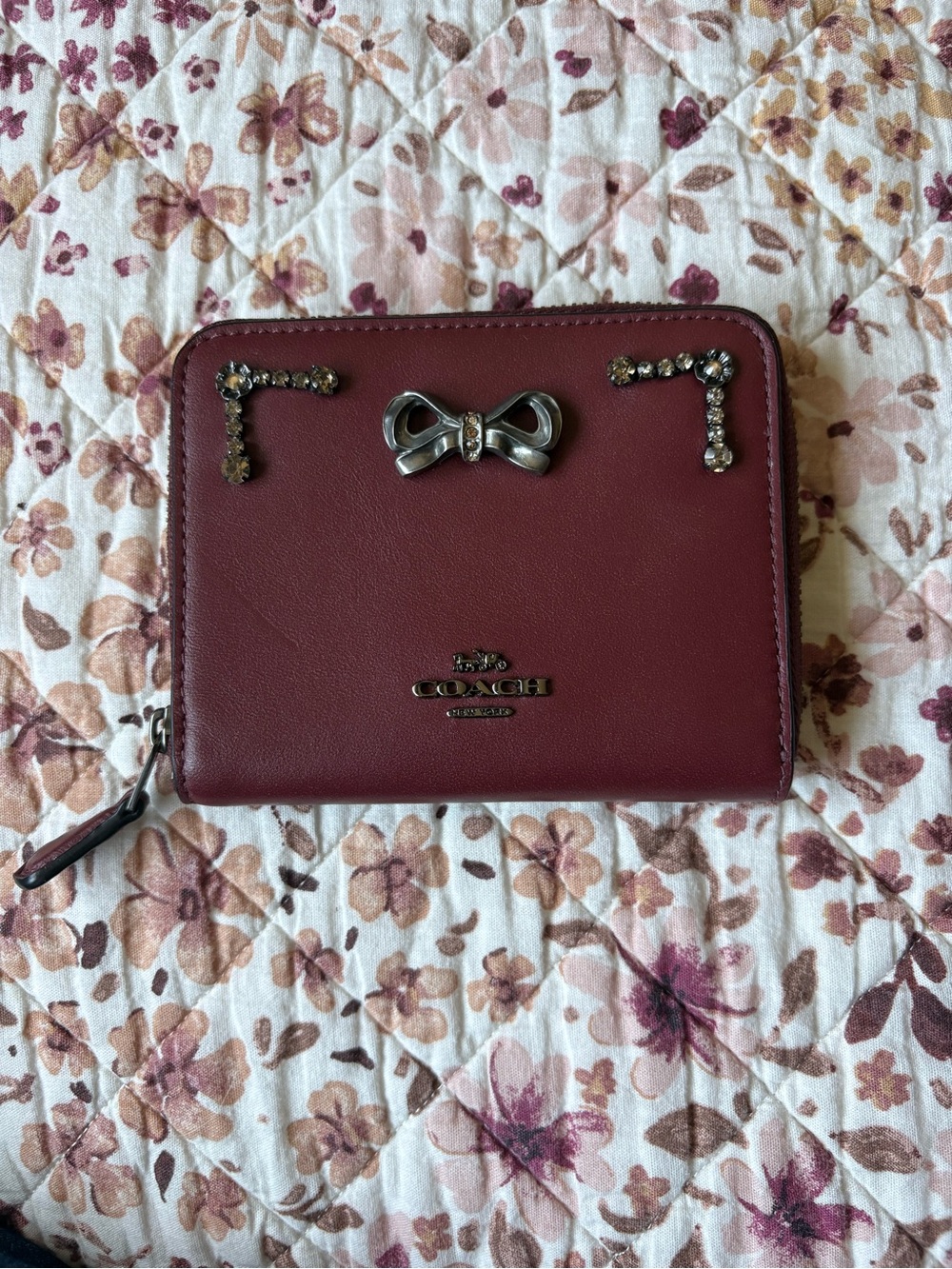 Coach Selena Gomez Limited Edition Bow-Appliqué Zip up Wallet in Wine